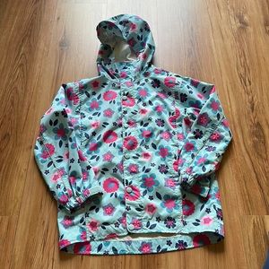 REI girls blue with pink flower rain jacket